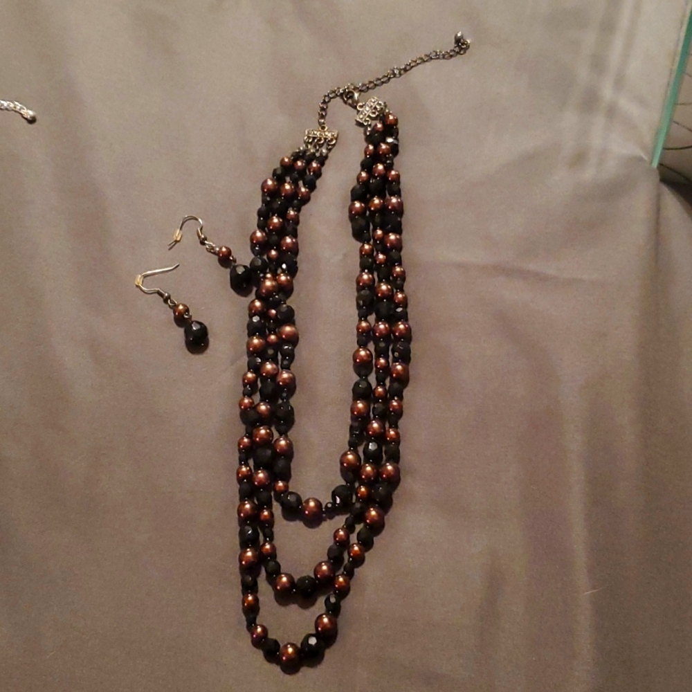 Charming Charlie Black and Gold necklace and earrings set